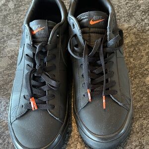 Nike Men’s Black Sneakers with Orange Accents